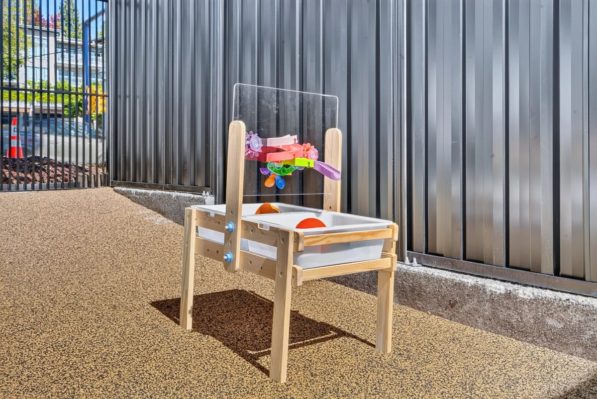 Outdoor art easel with paint pots for open-air creativity