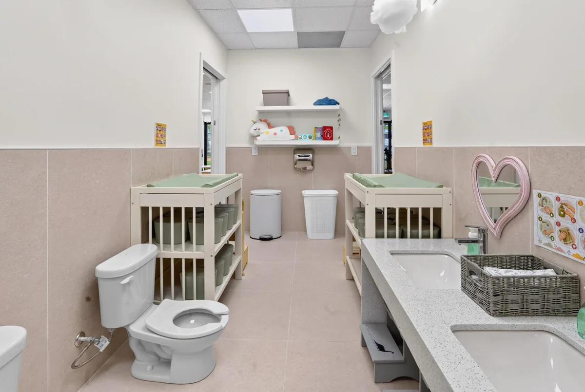 Child-height sinks and toilet in the MIM washroom